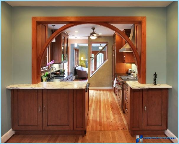 The design of the arch between the living room and kitchen