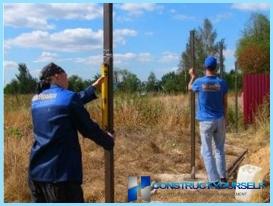 Installation of metal fence photo