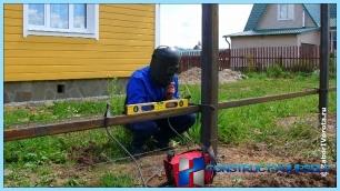 Installation of metal fence photo