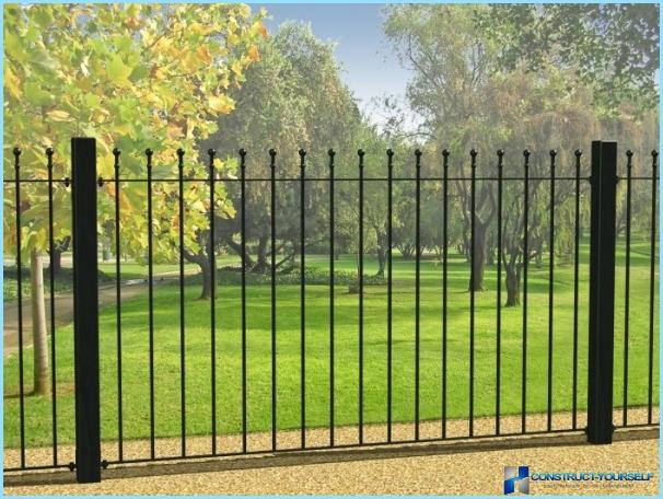 Installation of metal fence photo