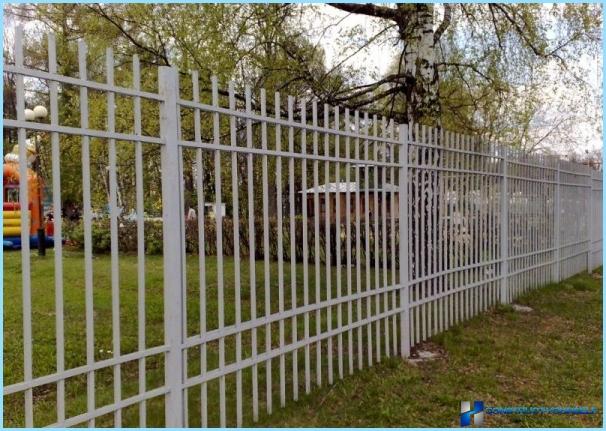 Installation of metal fence photo