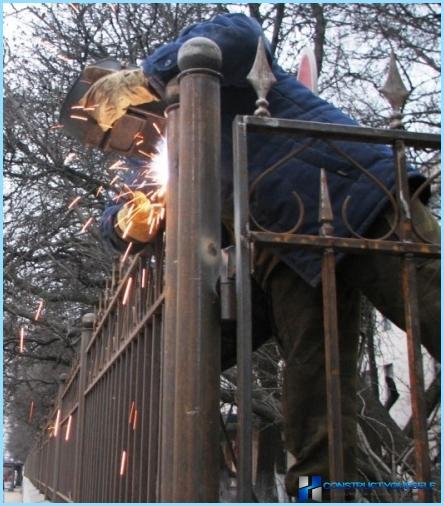 Installation of metal fence photo