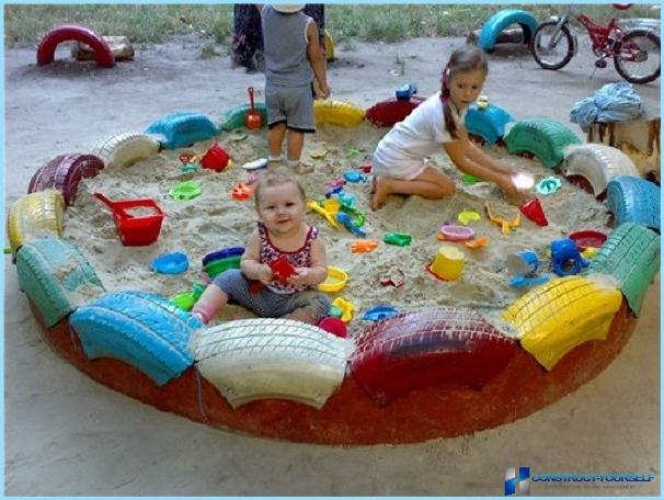 Gør-det-selv-sandkasse lavet af dæk