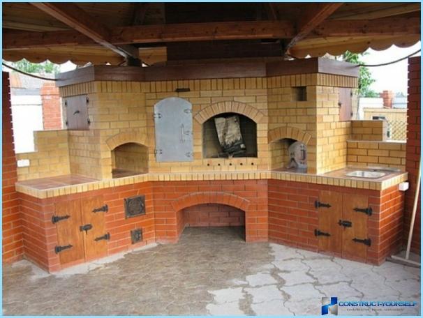 The modern design of the gazebo with grill and barbecue