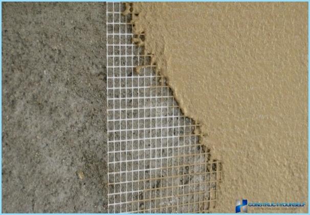 The plastering of walls with cement-sand mortar