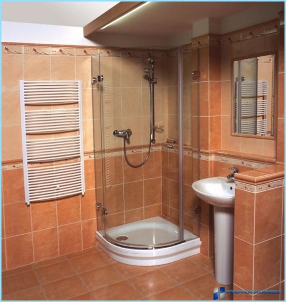 Shower cabin in the interior of a small bathroom