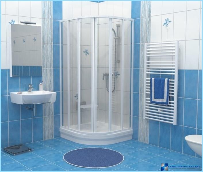 Shower cabin in the interior of a small bathroom
