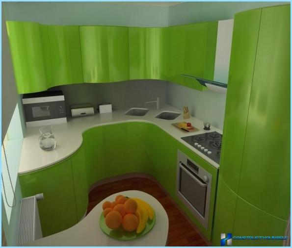 Kitchen in green and white tones
