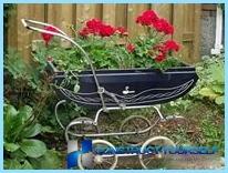 Beautiful design and decoration of flower beds and flower beds at the cottage