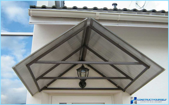 The canopies over the entrance of metal