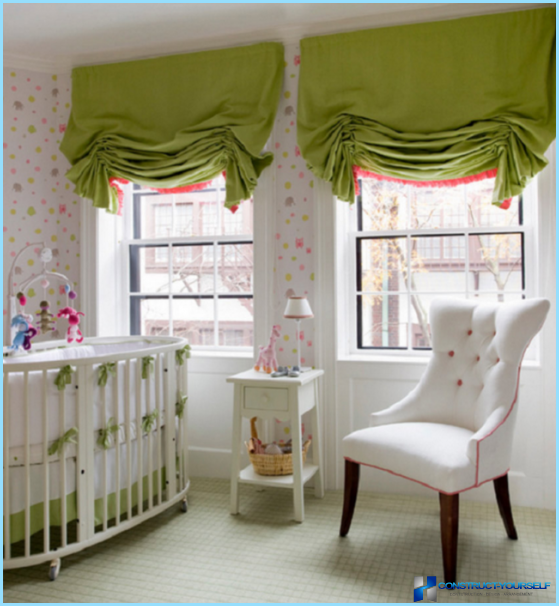 Short curtains to the window sill in the bedroom interior