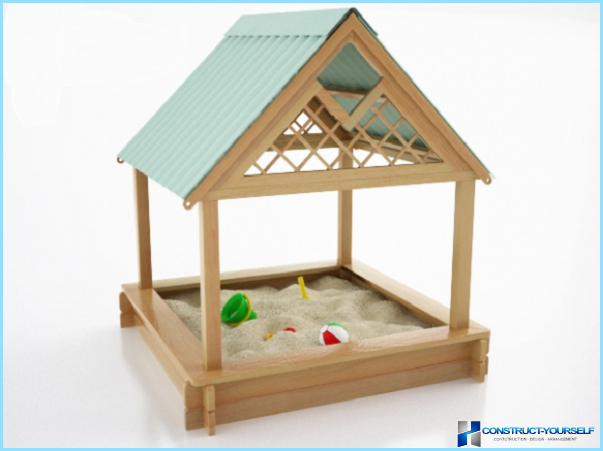 A children's sandbox out of wood